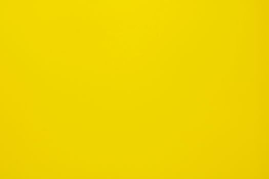 Bright yellow textured background, perfect for design projects and presentations.