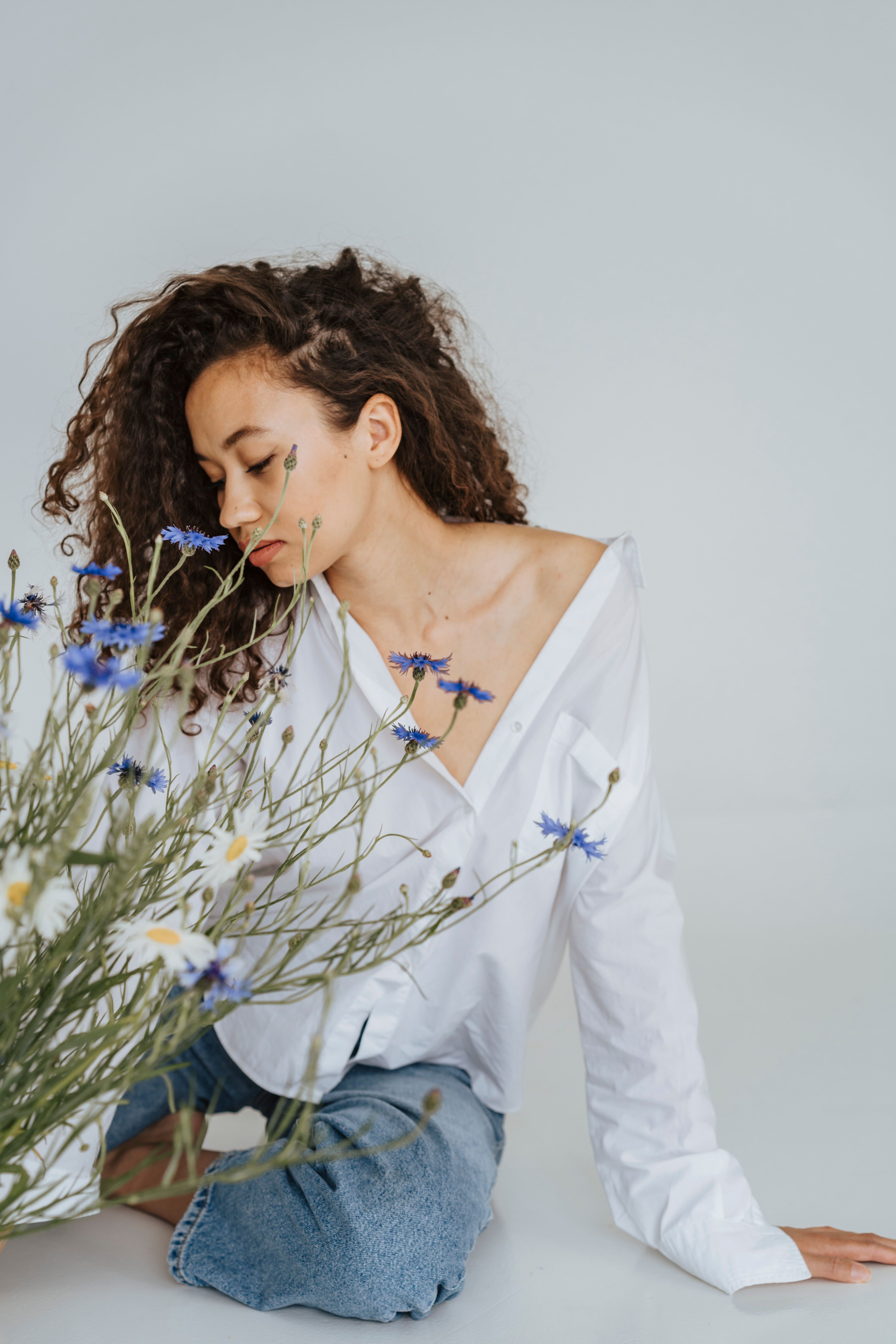 A Woman in White Long Sleeve Shirt · Free Stock Photo