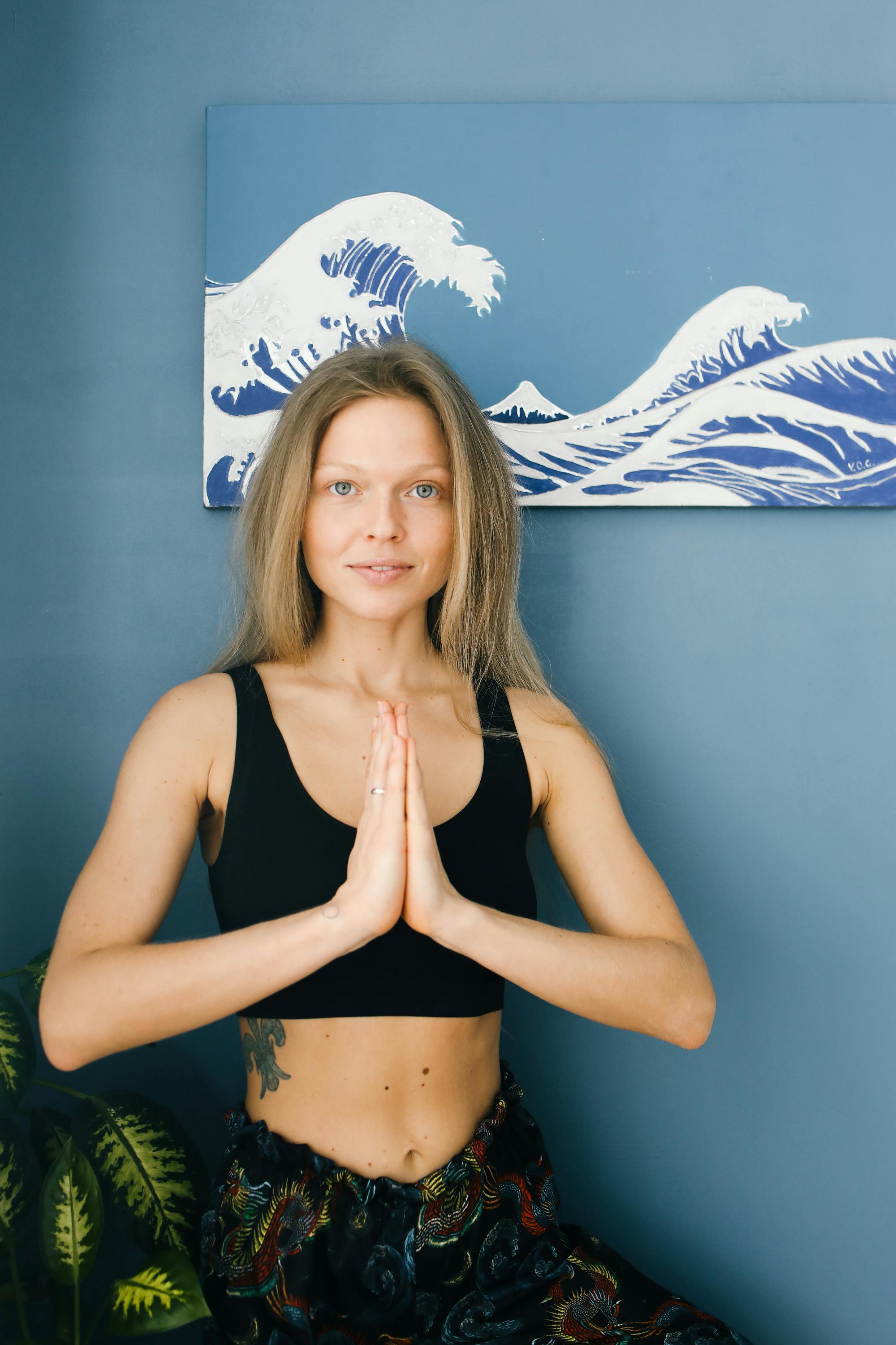 medium full shot of a woman with her hands pressed together