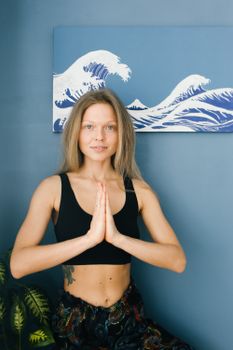 Medium Full Shot Of A Woman with Her Hands Pressed Together