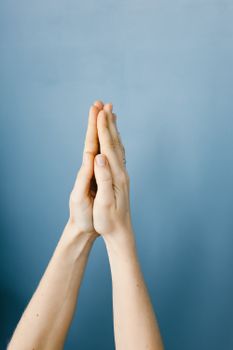 A Person's Hands Pressed Together