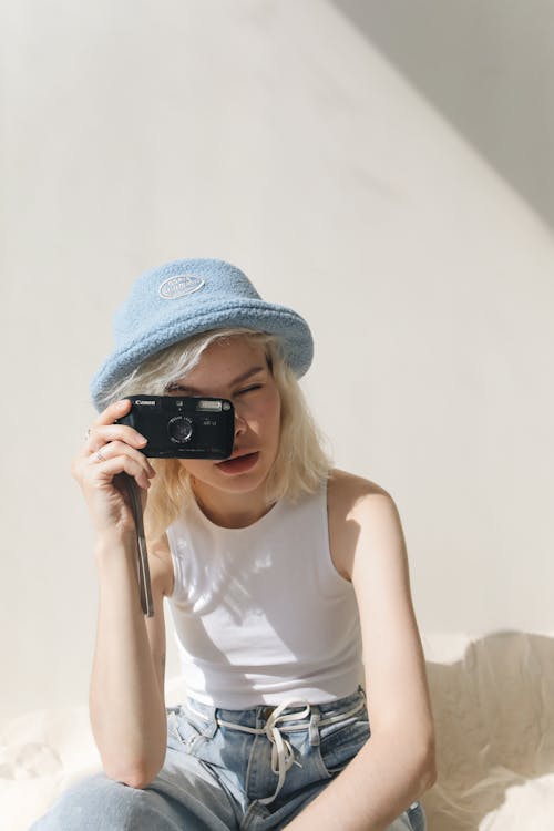 Blonde Woman Taking Photo