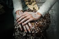Man and Woman Holding Hands