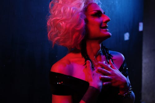 Drag Queen With Hands on Chest
