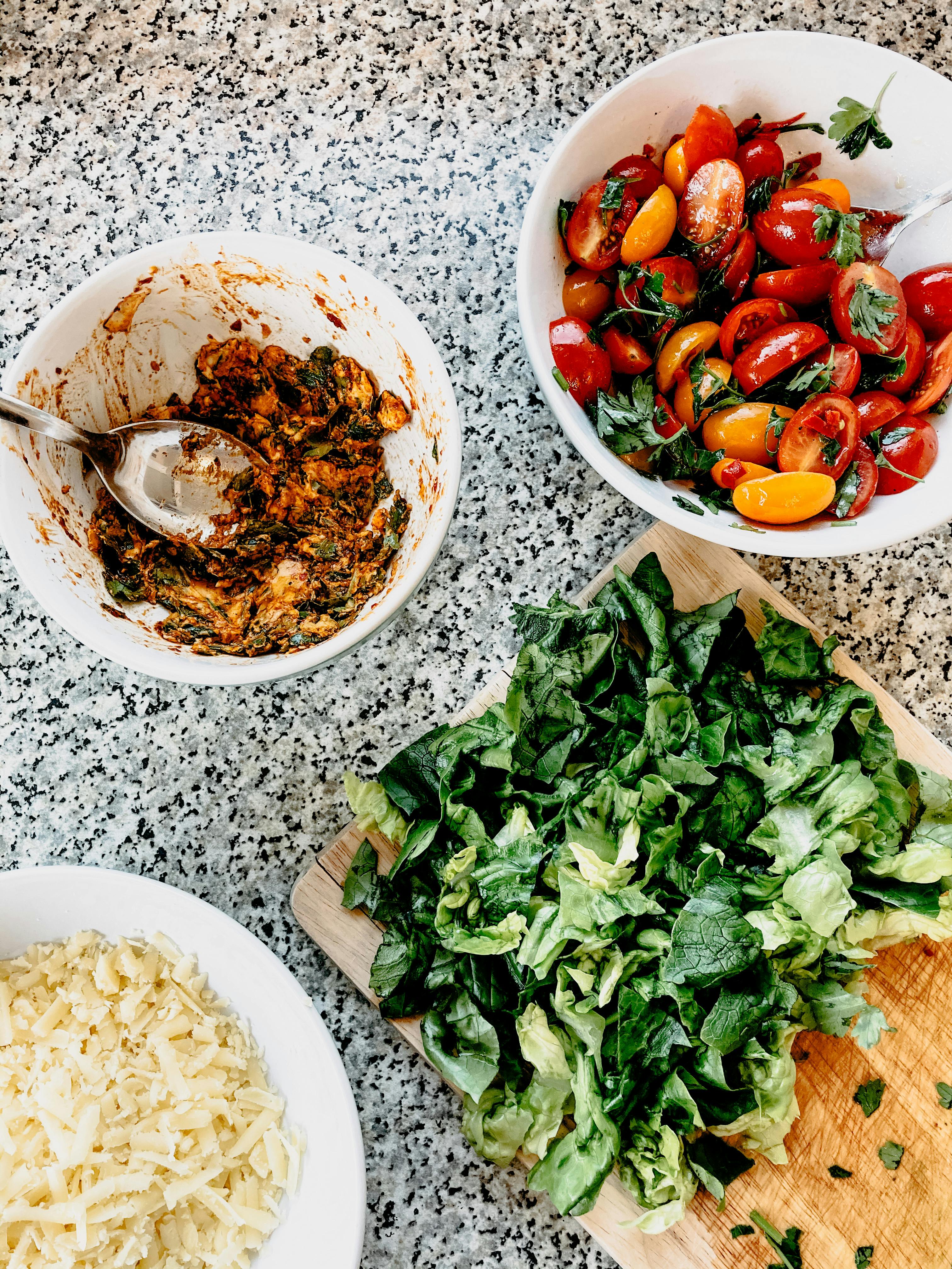 bowls with various ingredients on kitchen table