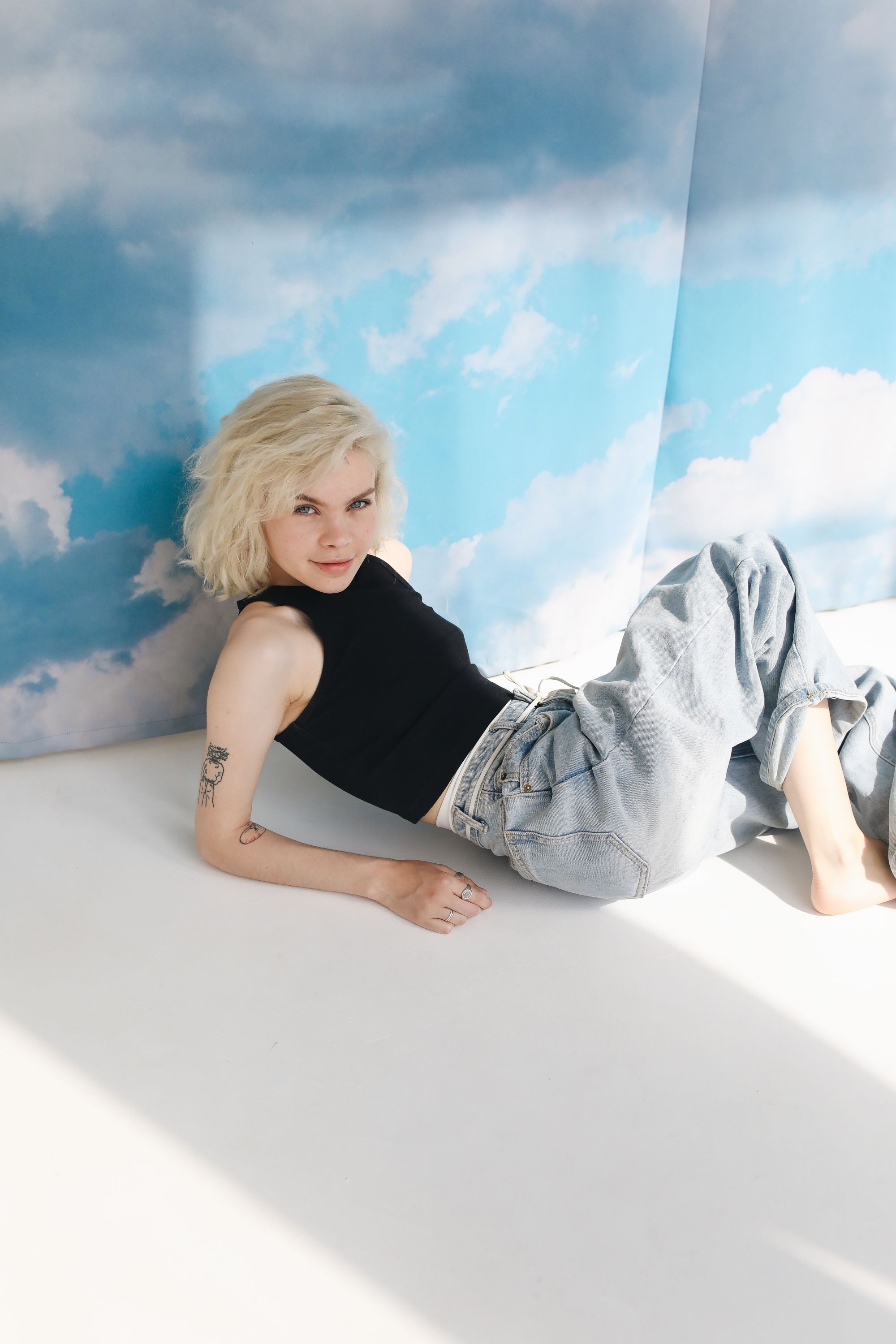 Girl in Black Tank Top and Blue Denim Jeans · Free Stock Photo