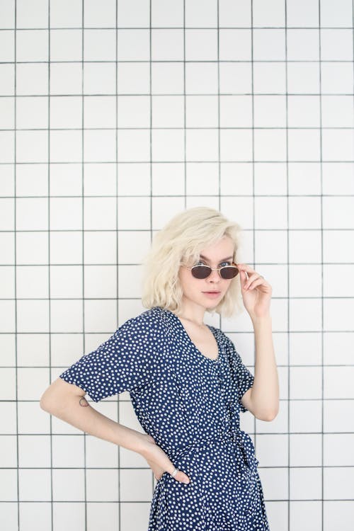 Free Photo of Girl in Blue Polka Dots Dress Wearing Sunglasses Stock Photo