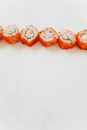 Orange and White Doughnuts on White Surface