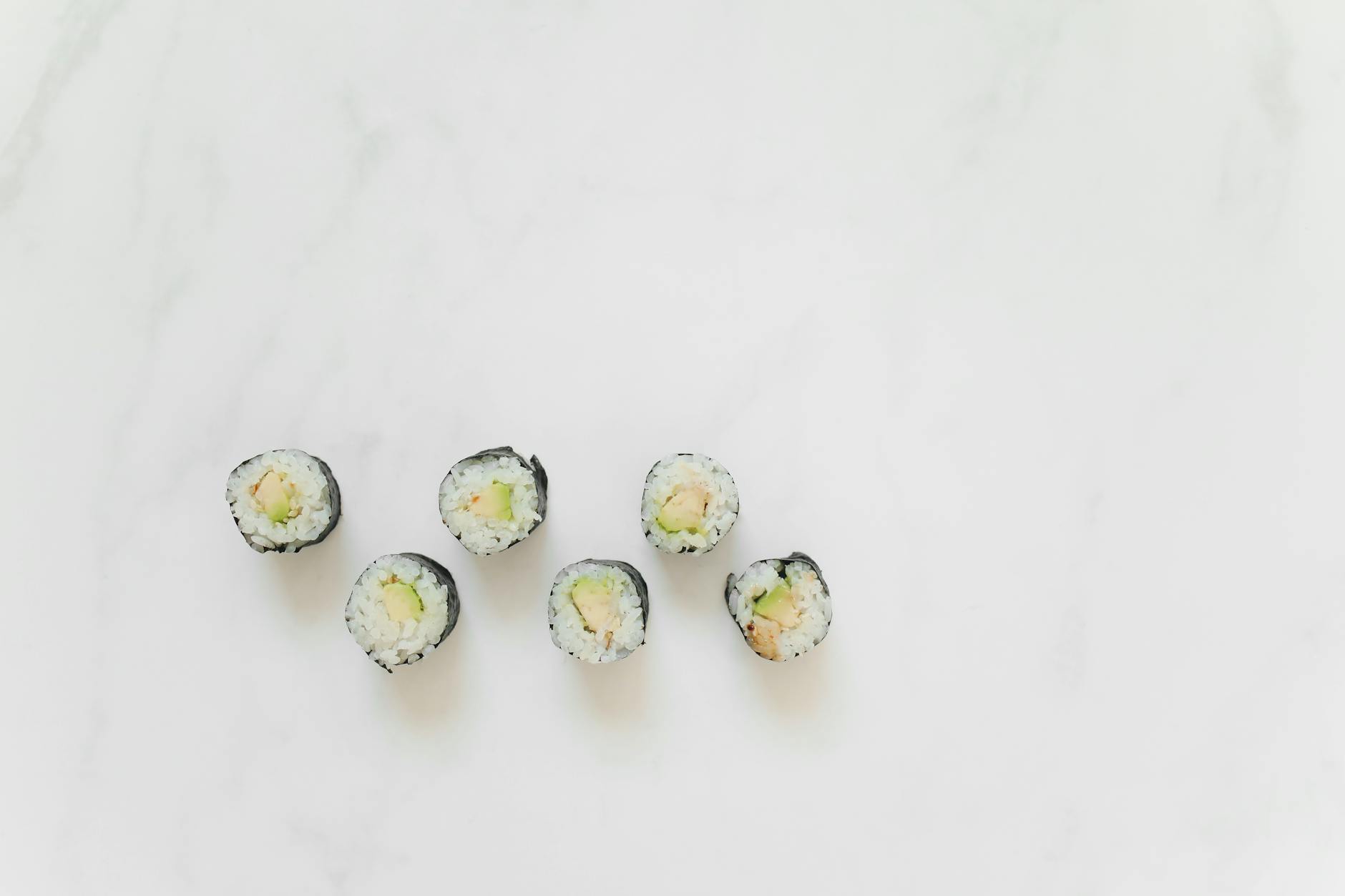Sushi Rolls on a Marble Counter