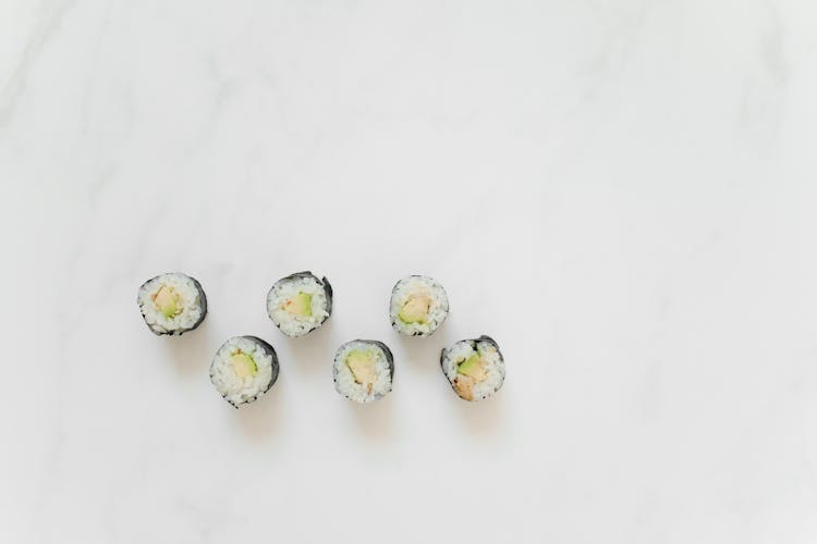 Sushi Rolls On A Marble Counter