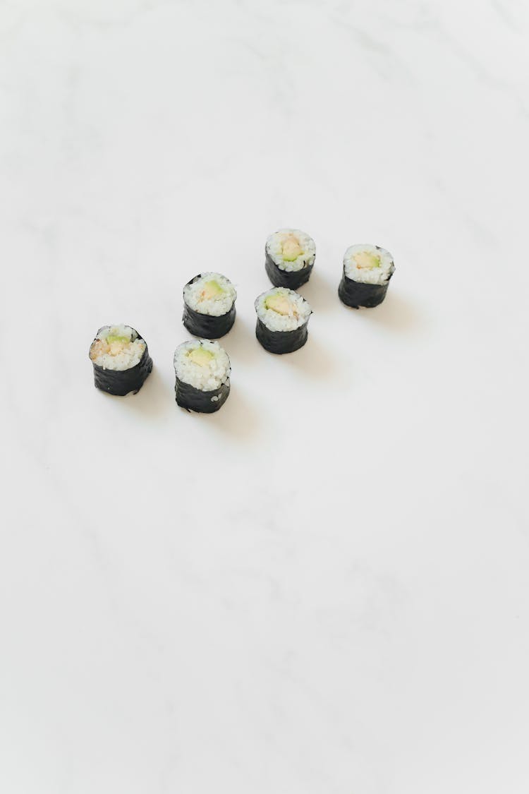 Sushi Rolls On A Marble Counter 