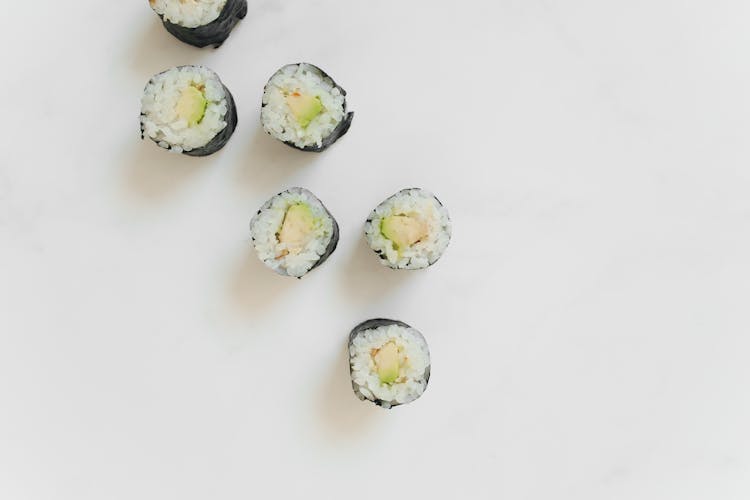 Sushi Rolls On A Marble Counter 