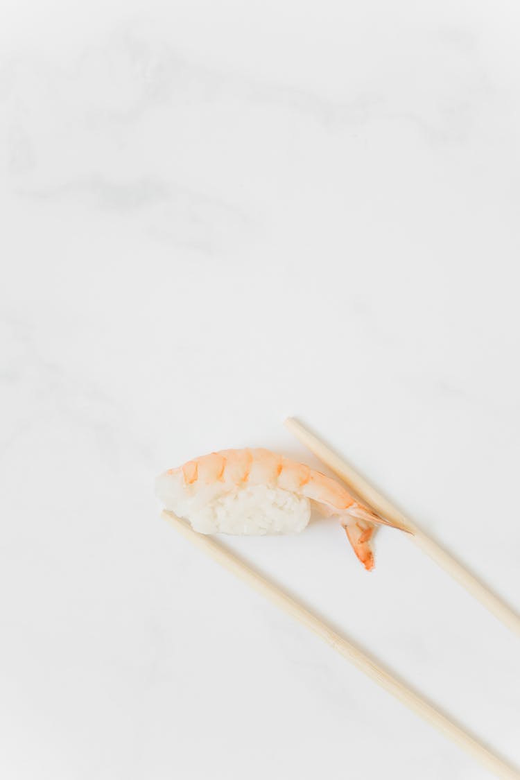 Chopsticks With Shrimp And Rice