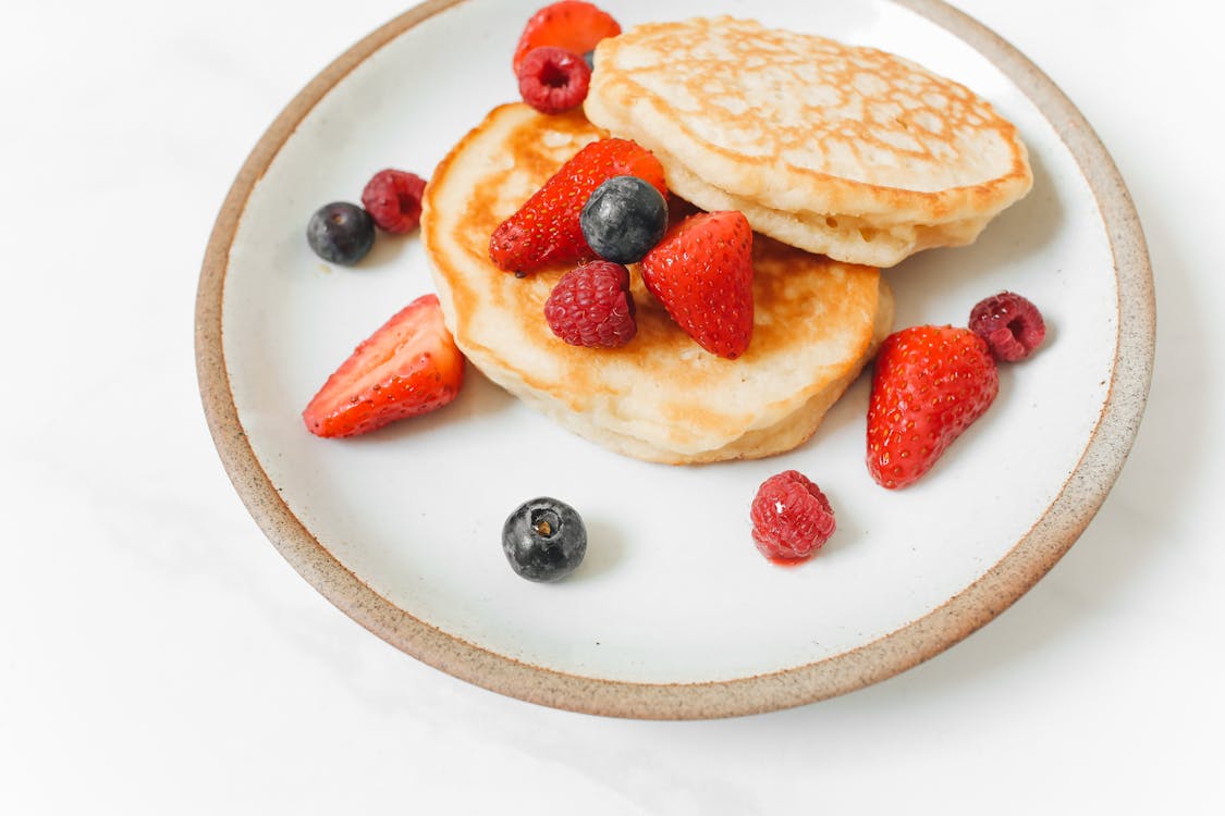 Free Pancakes with Fresh Fruits Stock Photo