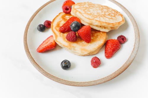 Free Pancakes with Fresh Fruits Stock Photo