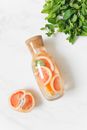 Sliced Orange Fruit in Clear Glass Jar