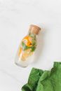 Clear Glass Bottle With Brown Liquid