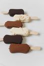 White Ice Cream on Brown Cone