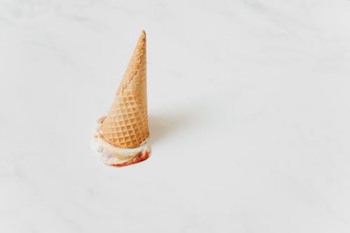 Ice Cream Dropped on White Background