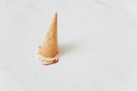Ice Cream Cone on White Surface