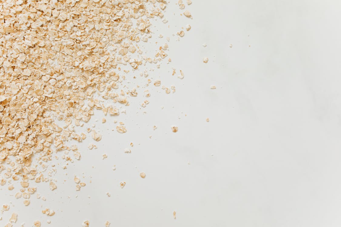 Free Small Oats on White Background Stock Photo