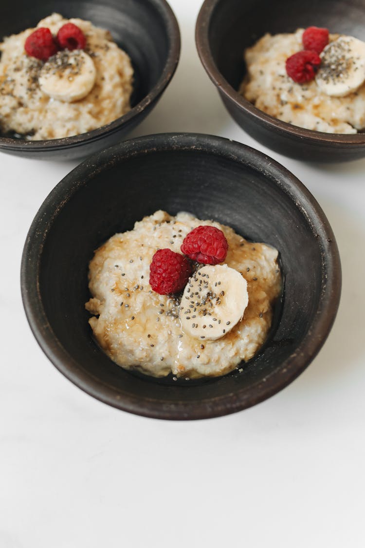 Oatmeal In Black Ceramic Bowls