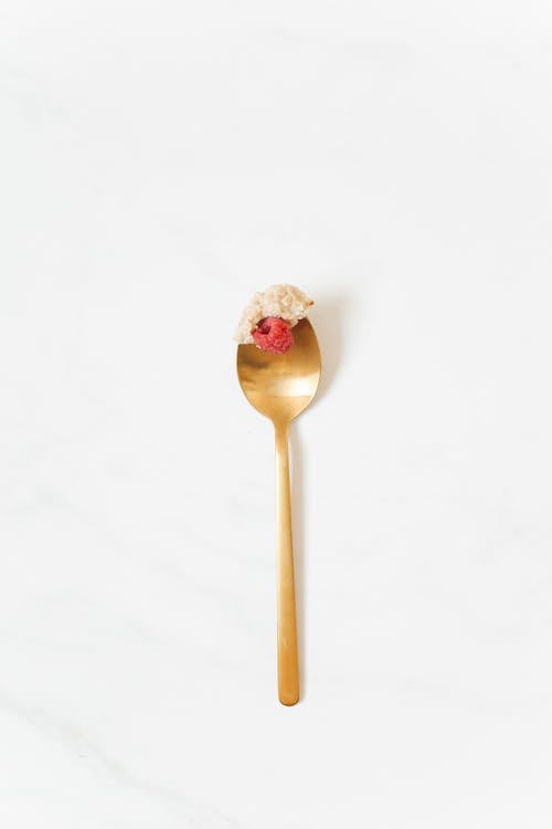 Raspberry on Golden Spoon