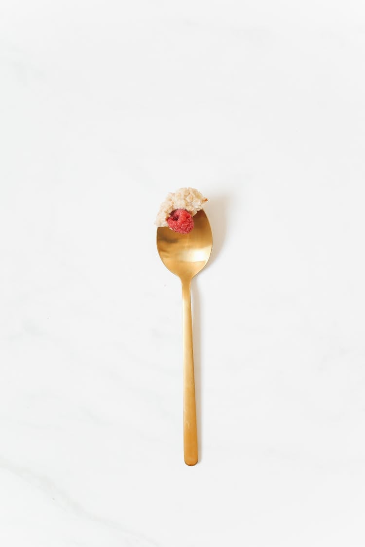 Raspberry On Golden Spoon