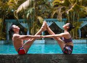 Couple Practicing Yoga
