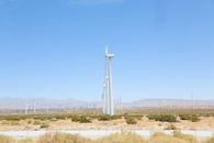 Rows of wind generators in field