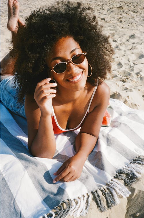 Free Smiling Woman on Beach Stock Photo