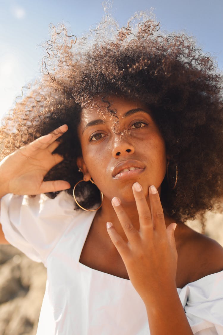 Woman Touching Her Face