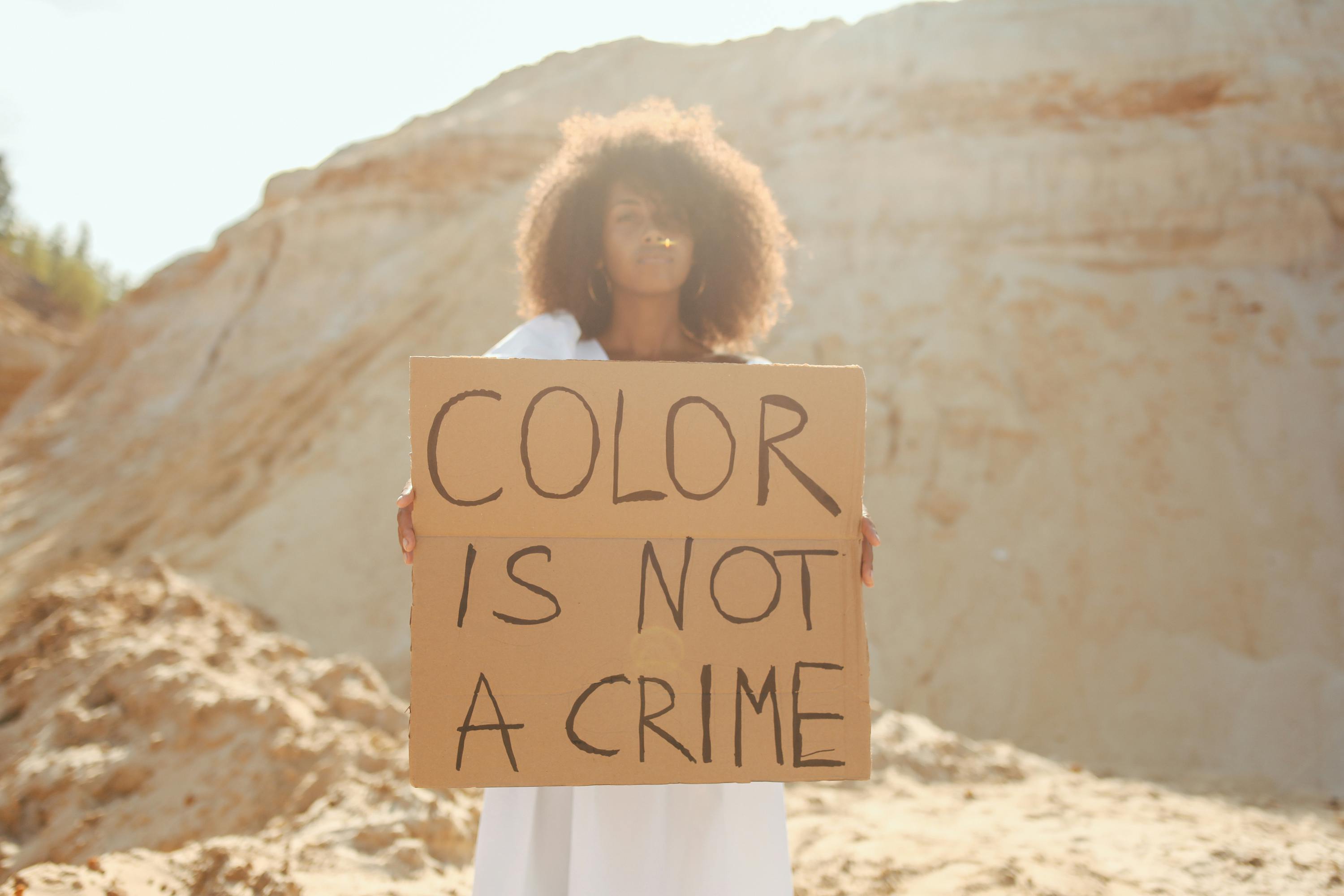 woman holding sign