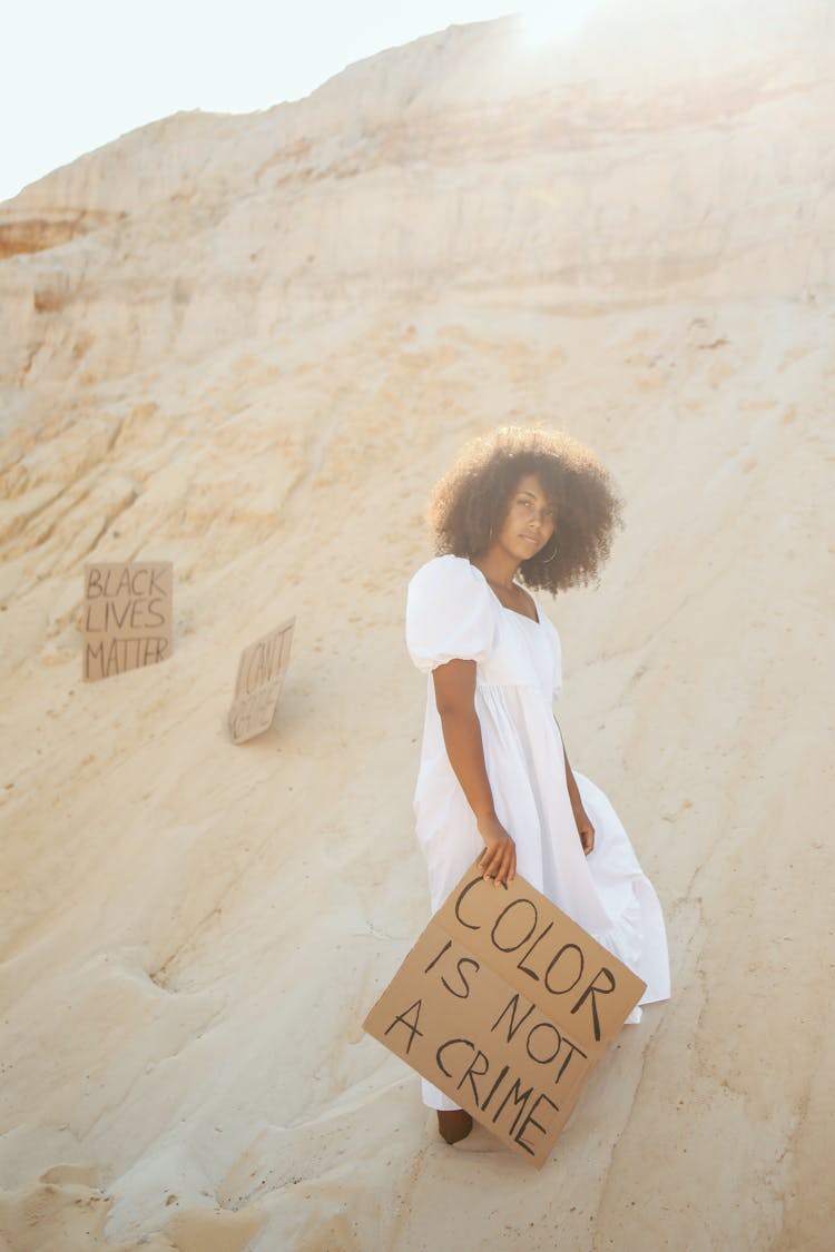 Woman In Dress With Transparent On Desert