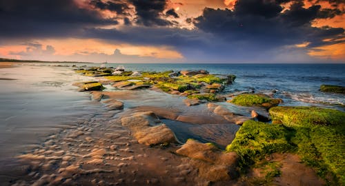 Бесплатное стоковое фото с живописное небо, закат, море