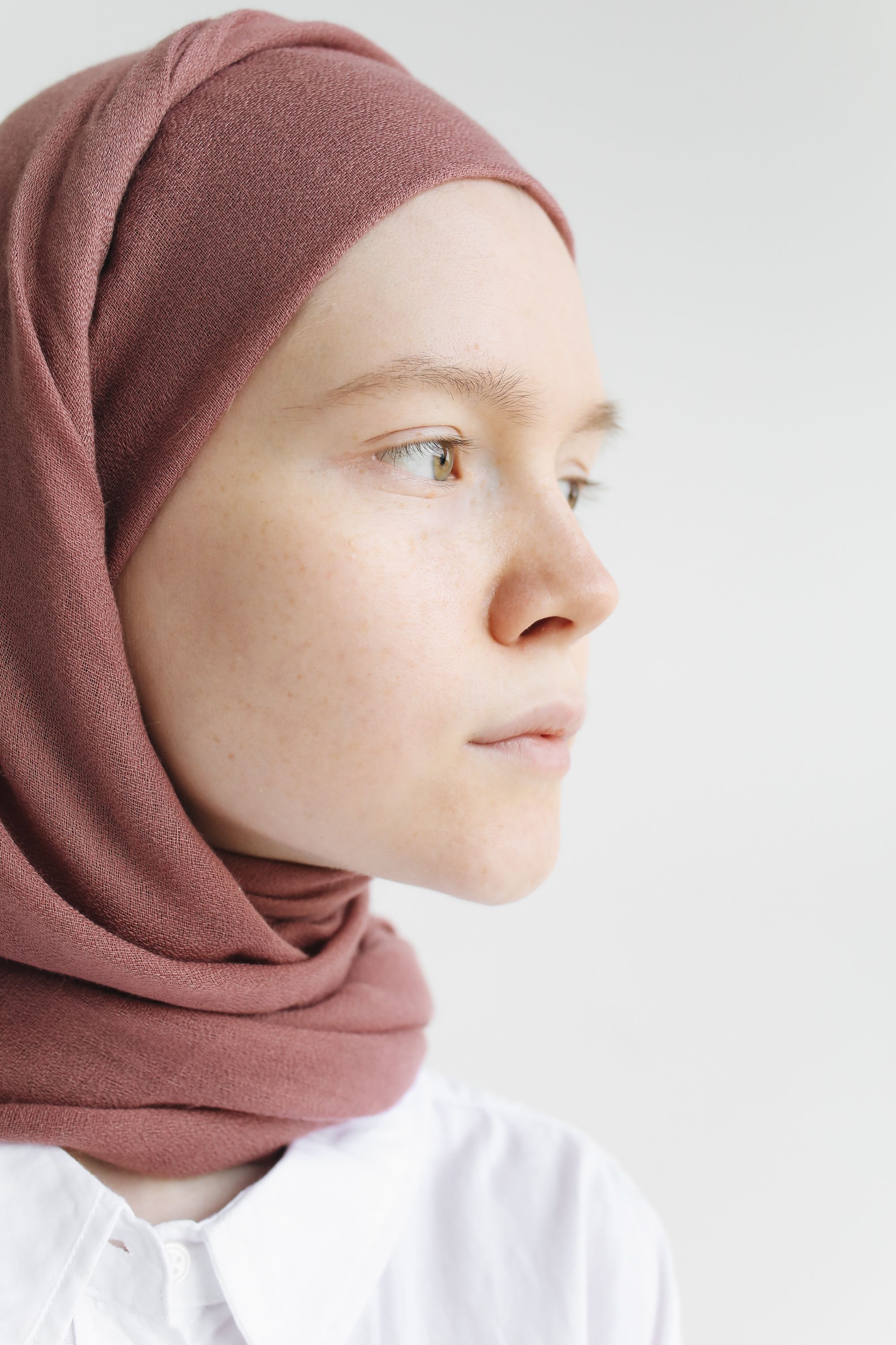 A Close-Up Shot of a Woman Wearing a Hijab · Free Stock Photo