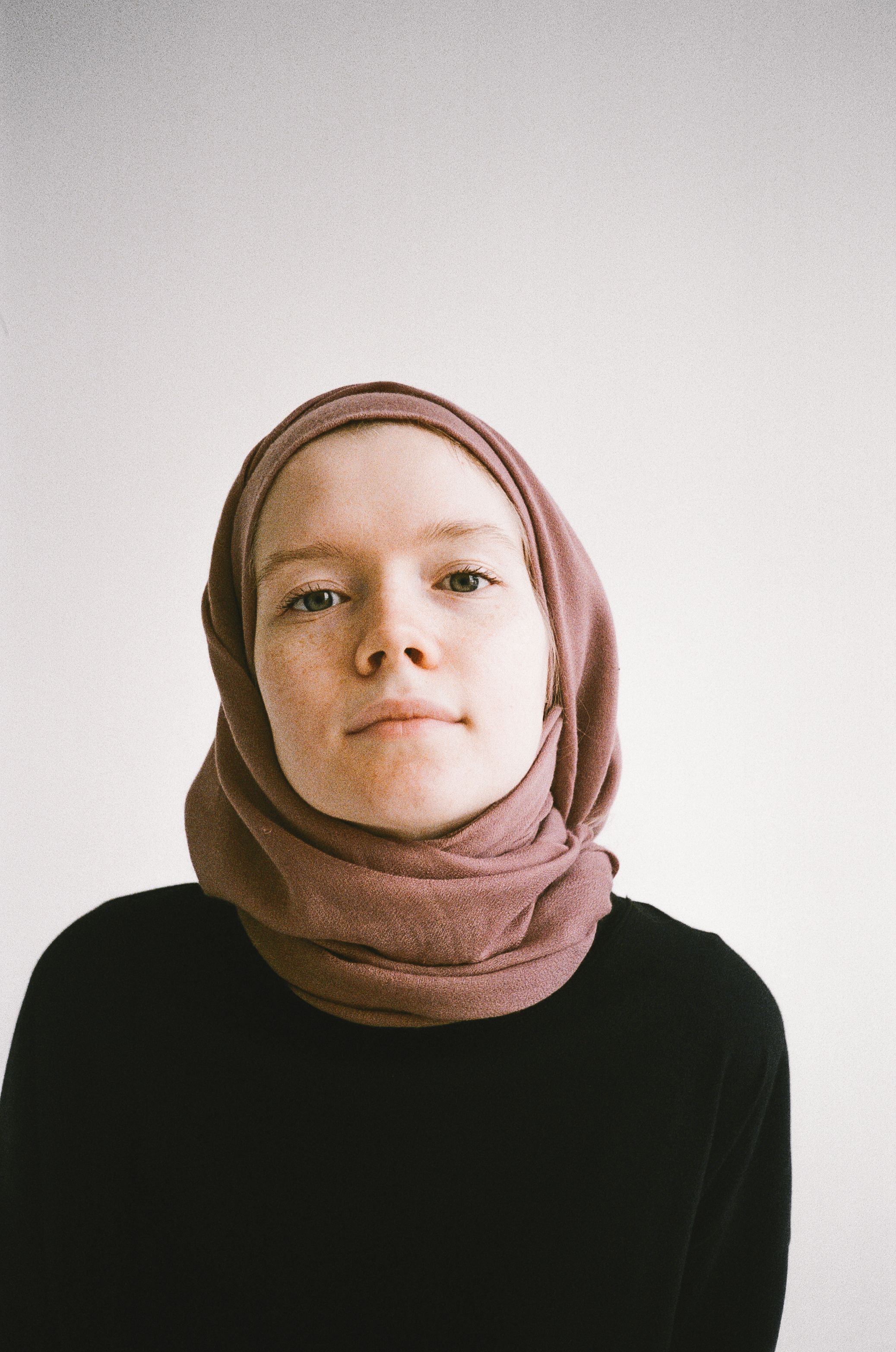 A serene portrait of a woman wearing a hijab, showcasing confidence and grace.