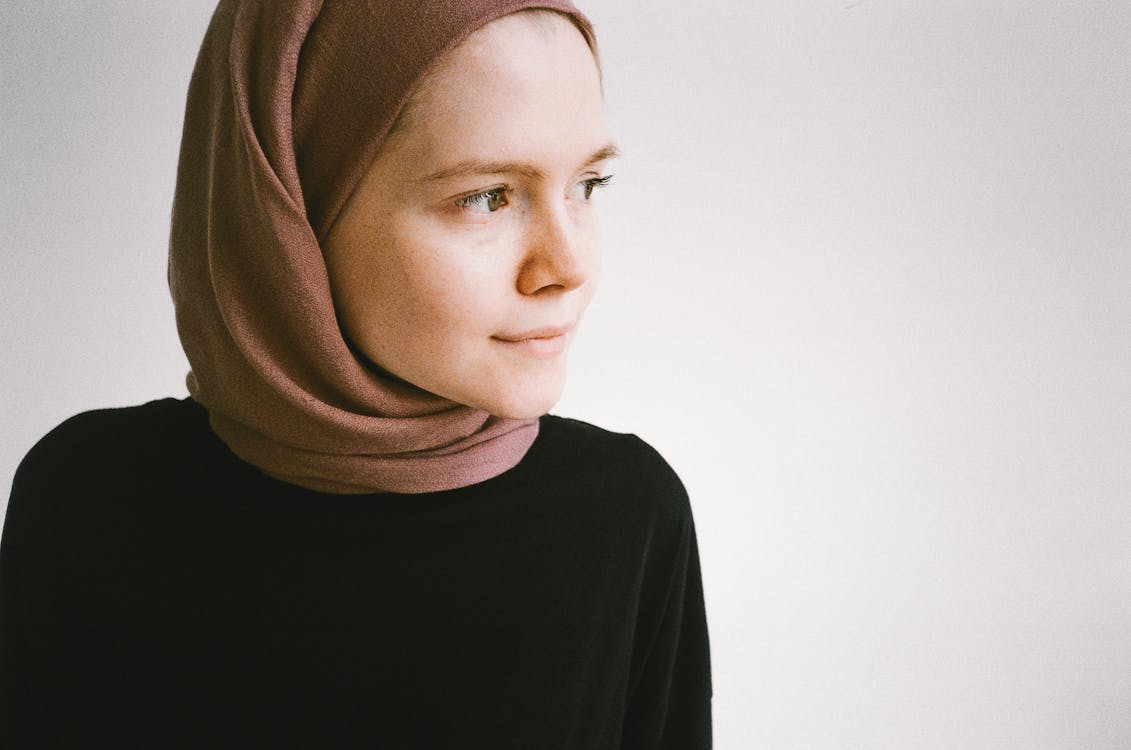Woman in Brown Hijab and Black Long Sleeve Shirt