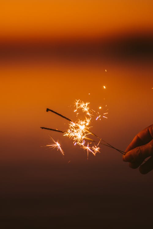 Free Person Holding Sparklers Stock Photo