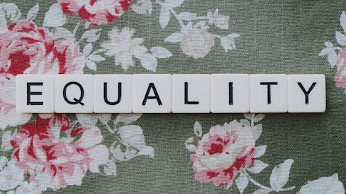 A Word Equality Spelled with White Letter Blocks