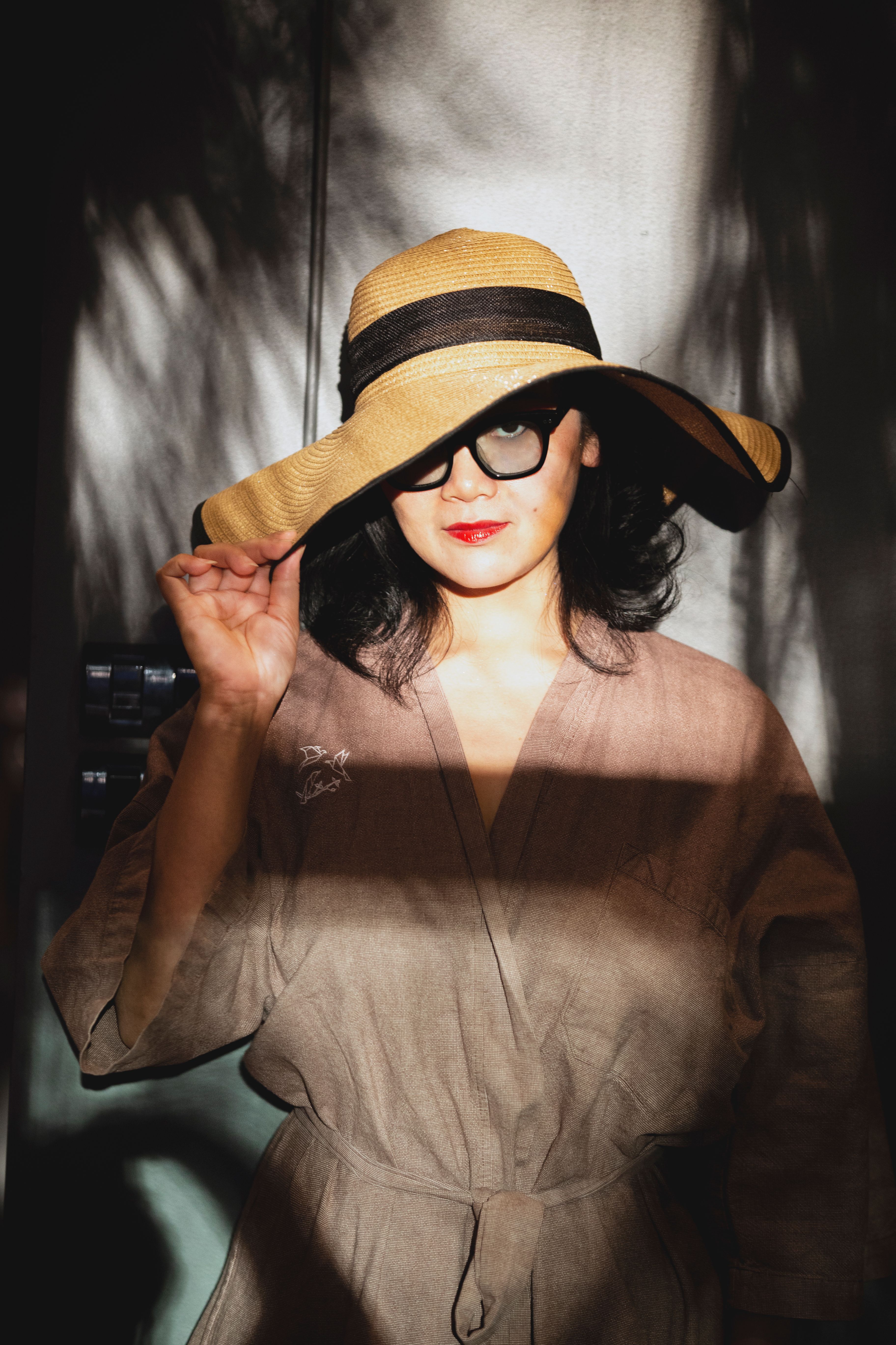 Woman Wearing a Brown Hat · Free Stock Photo