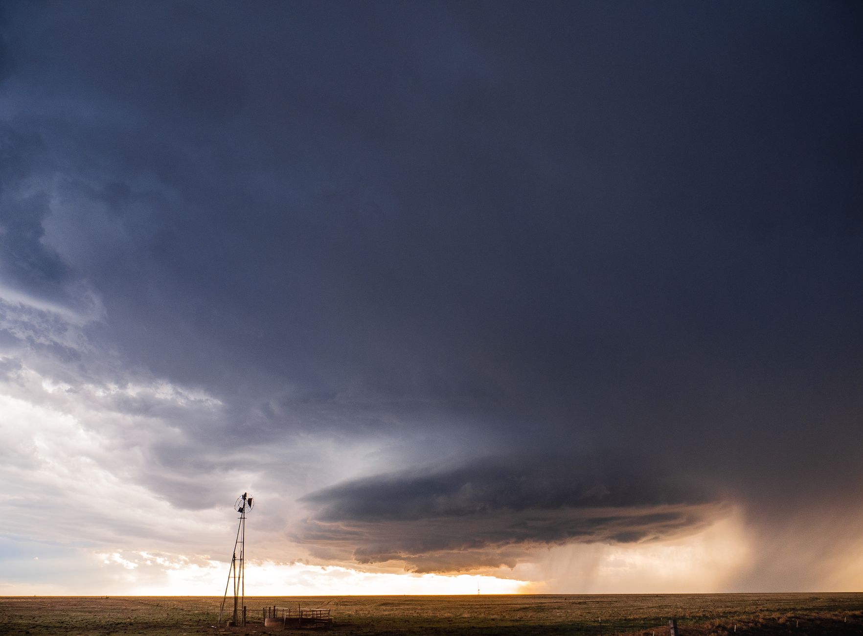 A striking image of dark storm clouds forming over the open fields of New Mexico.. pexels, striking, image