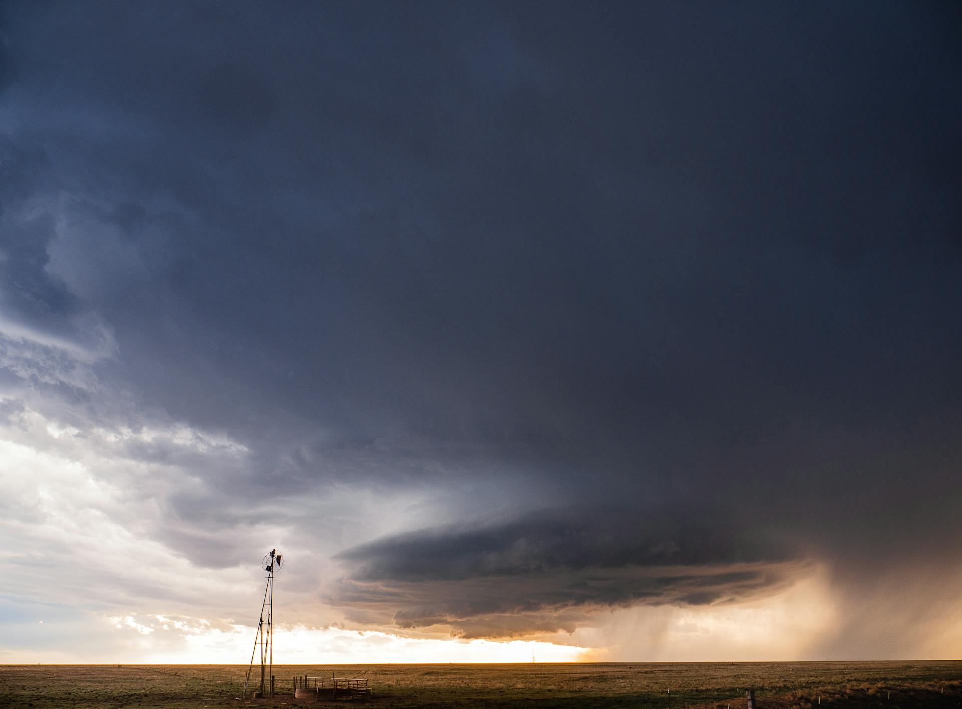 Dark Clouds Over a Brown Field in New Mexico