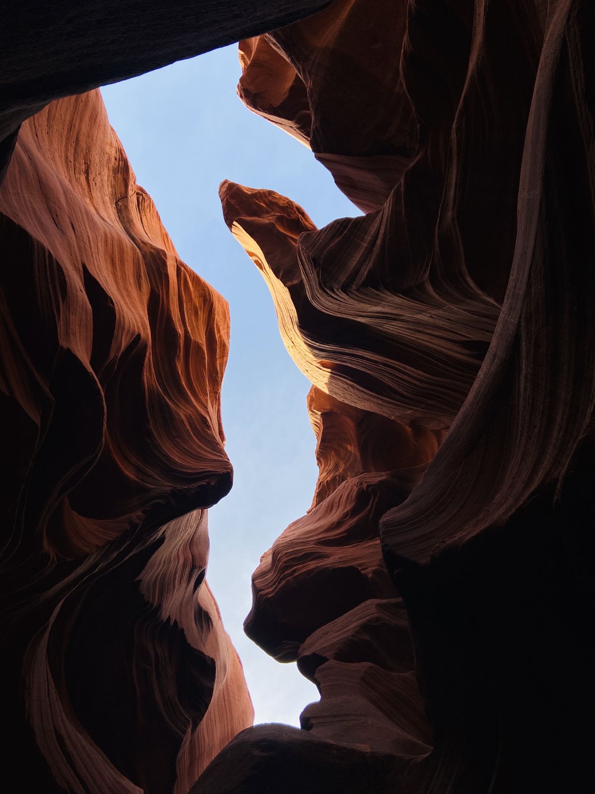 Sunlight streaming through eroded canyon walls