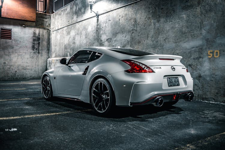 Luxury Parked Car On Asphalt Space