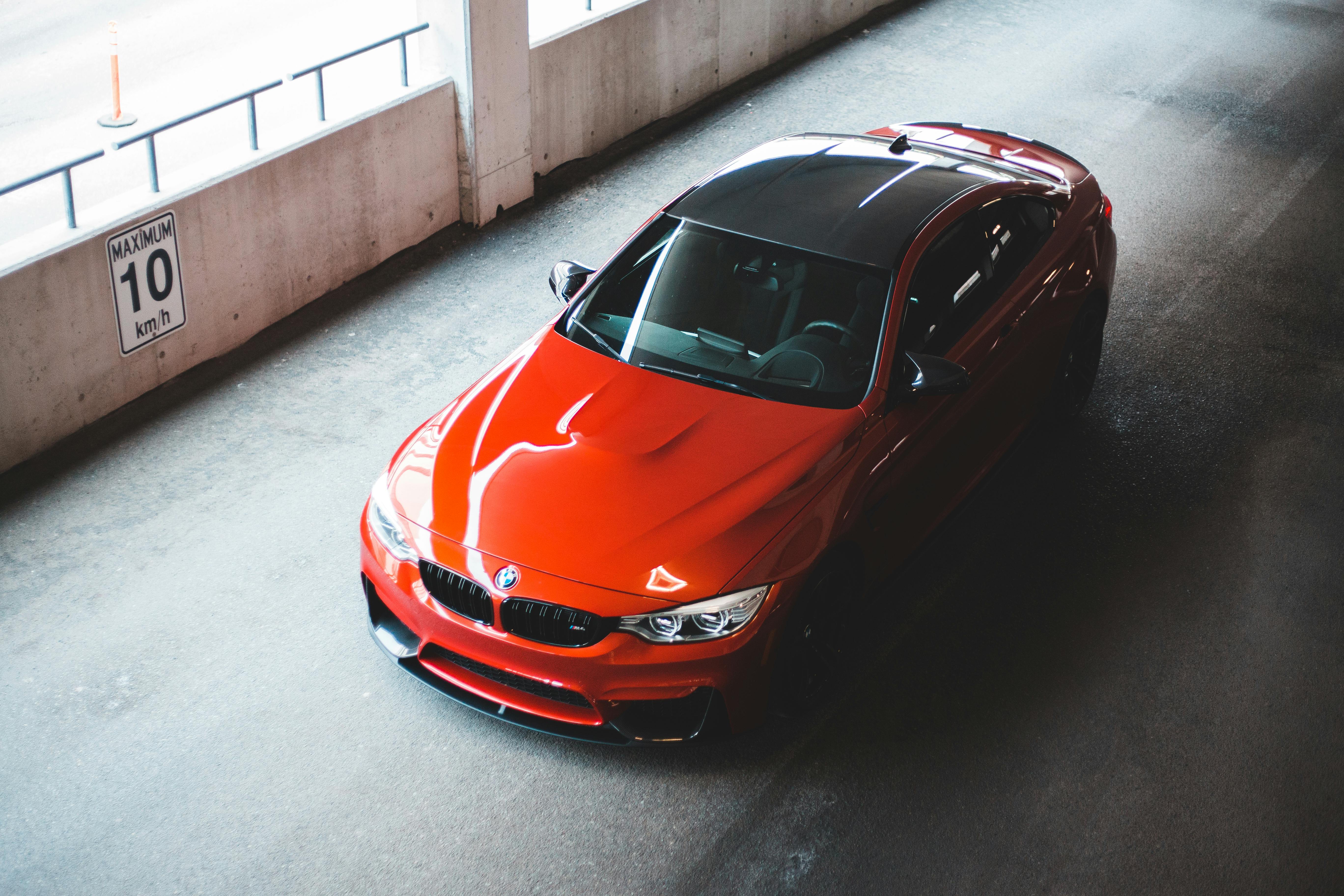 luxury red car on asphalt road