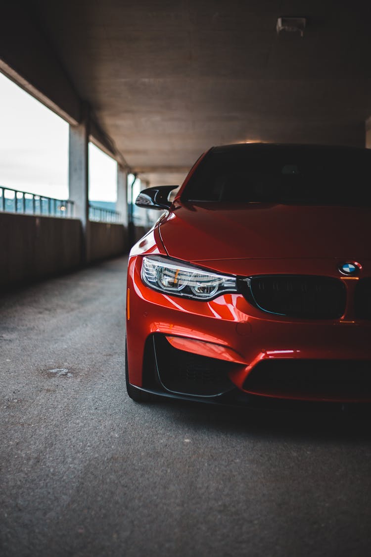 New Red Car On Parking Lot