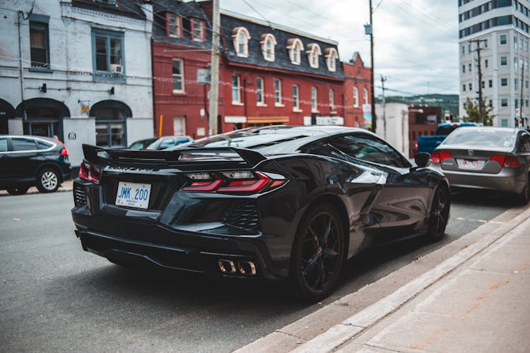 Modern Car On Street In Old City