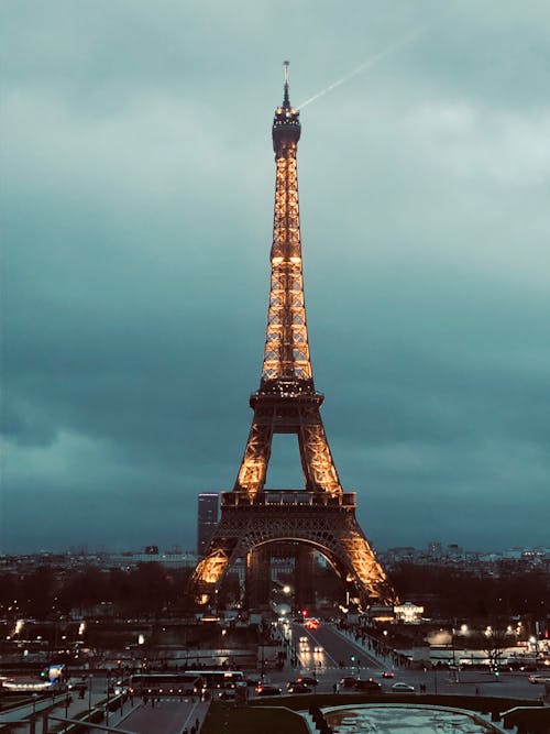 Eiffel Tower in Paris France under Cloudy Sky 