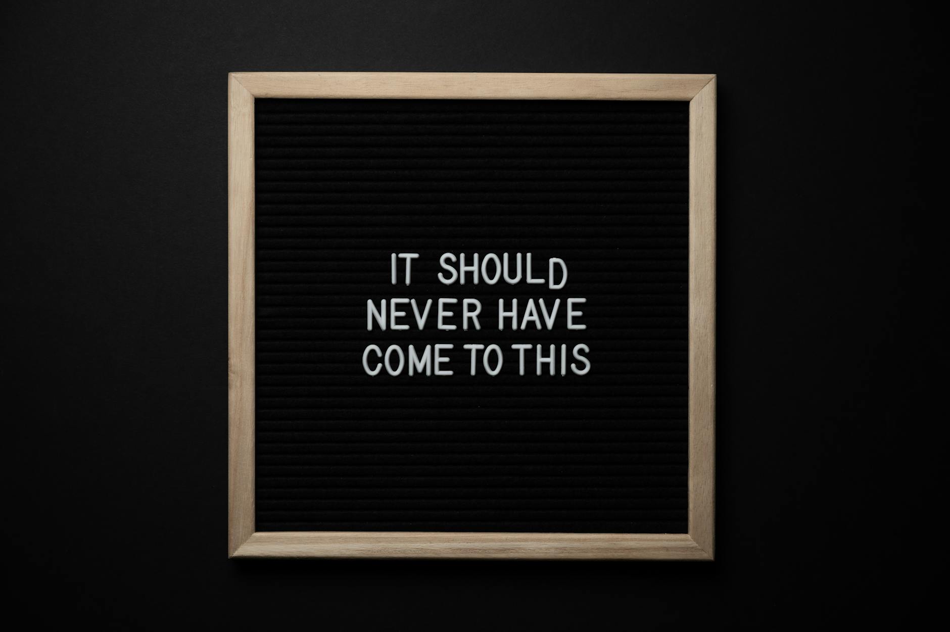 A black letter board with the phrase